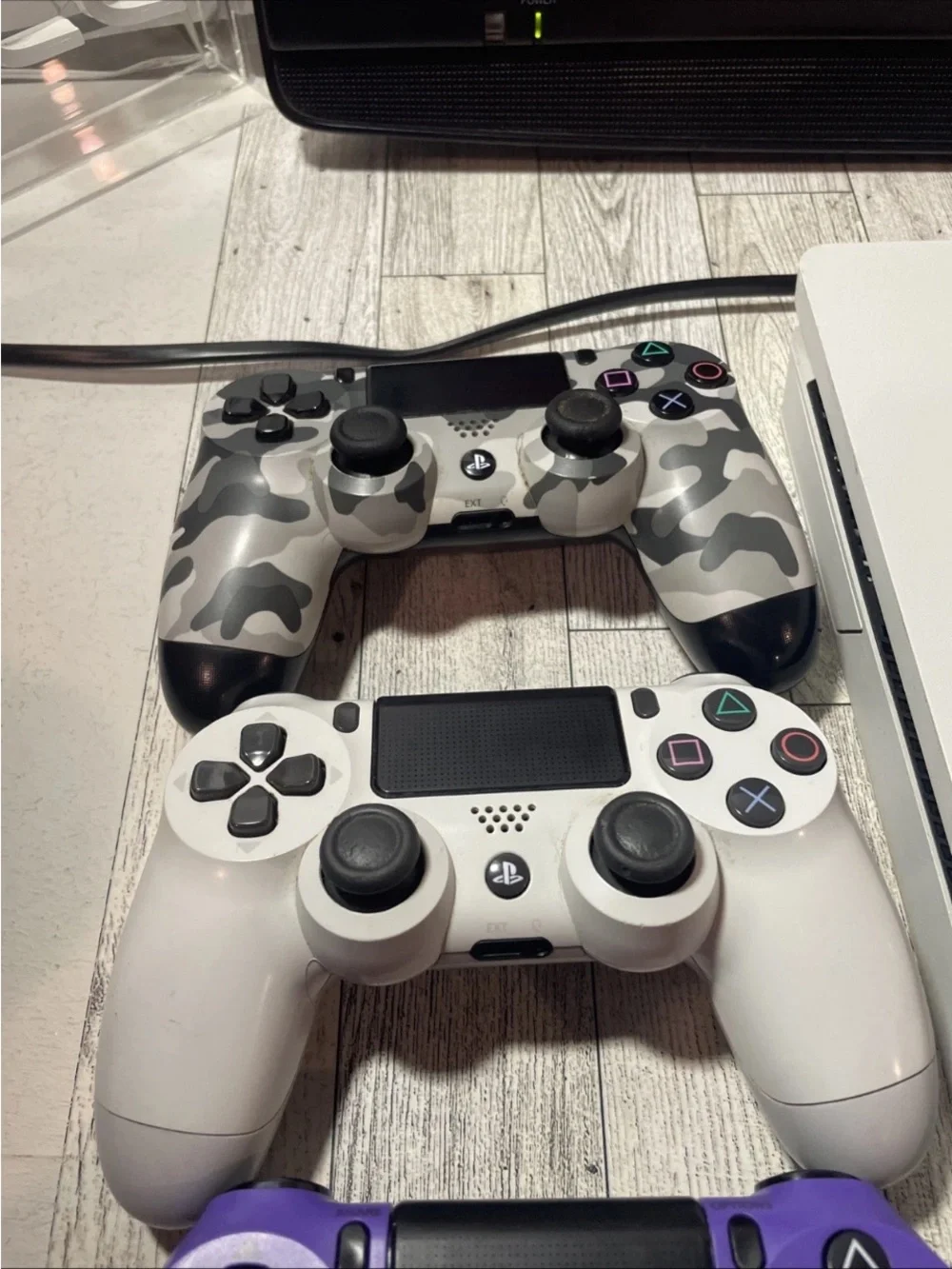 Sony White PS4 Slim with White, Purple and Camo Controllers